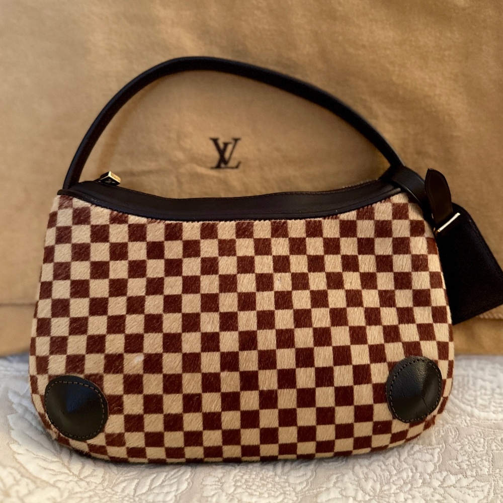 Authentic Louis Vuitton Sauvage Tigres Handbag